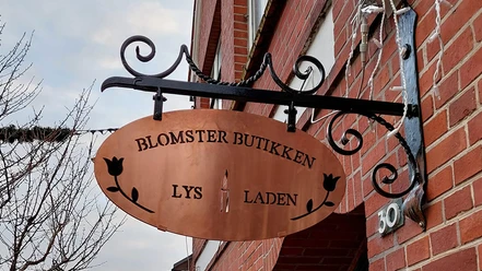 Lys-i-Laden,-Nordborg-skilt