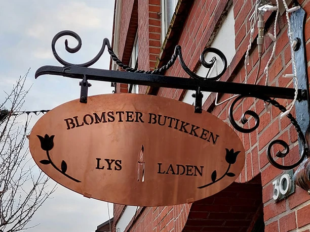 Lys-i-Laden,-Nordborg-skilt