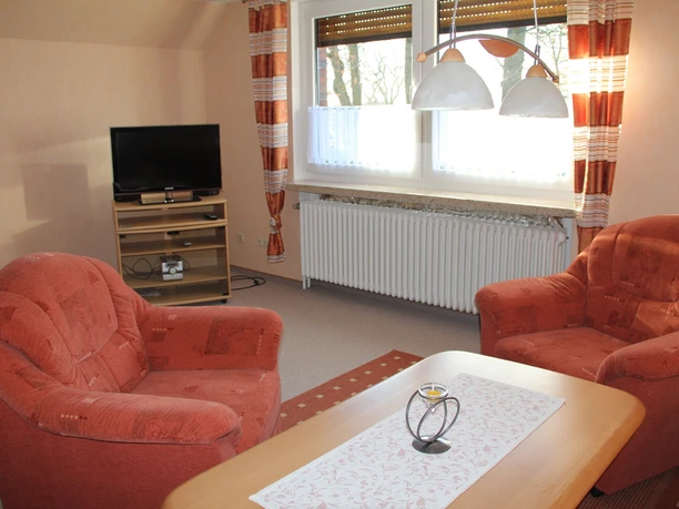 Wohnbereich mit SAT-TV Ferienwohnung Dankers in Stade