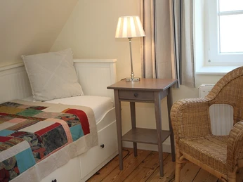 Einzelschlafzimmer Ferienwohnung "Kapitänskajüte"