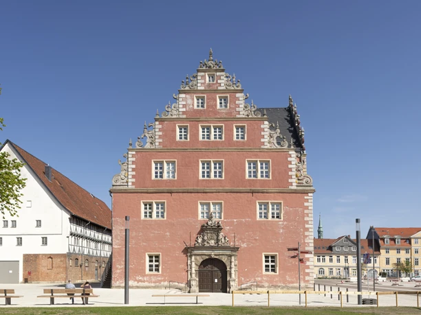 Zeughaus-Wolfenbuettel.jpg Striking pink stone house with strikingly decorated gable