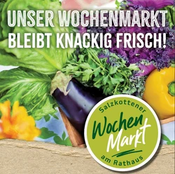 Frisches Gemüse wie Paprika, Aubergine und Salat sind auf einem Plakat für den Wochenmarkt abgebildet.