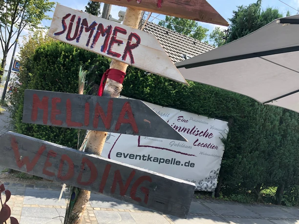 IMG_4001.jpeg Signage with wooden arrows "Summer "Melina" "Wedding"