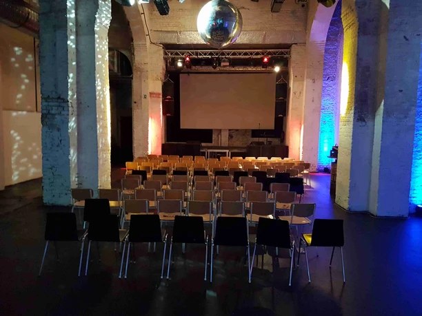 20181014_210414.jpg Event location with row seating facing the screen from the front