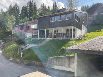 Zytlose Sörenberg Nord-West Fassade und Carport