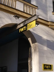 Free Workshop Theatre Cologne Photograph of the entrance to the Free Workshop Theater Cologne with yellow sign above the arch.