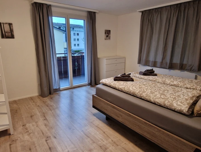 Chambre à coucher de l'appartement de vacances à Ennetbürgen