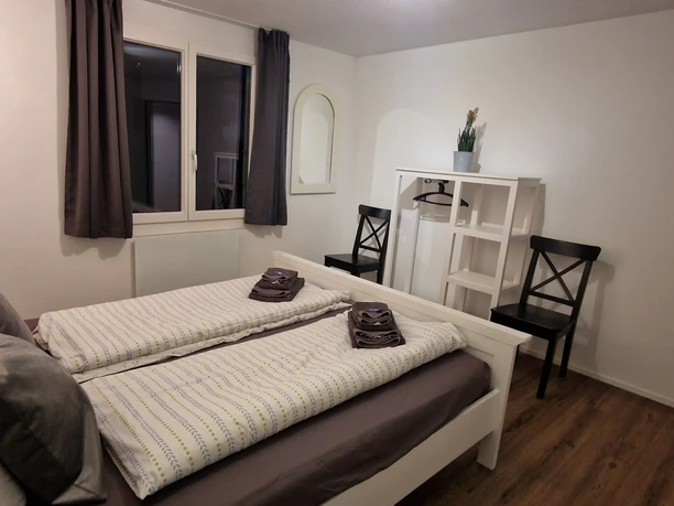 Bedroom in the Ennetbürgen holiday flat with large terrace