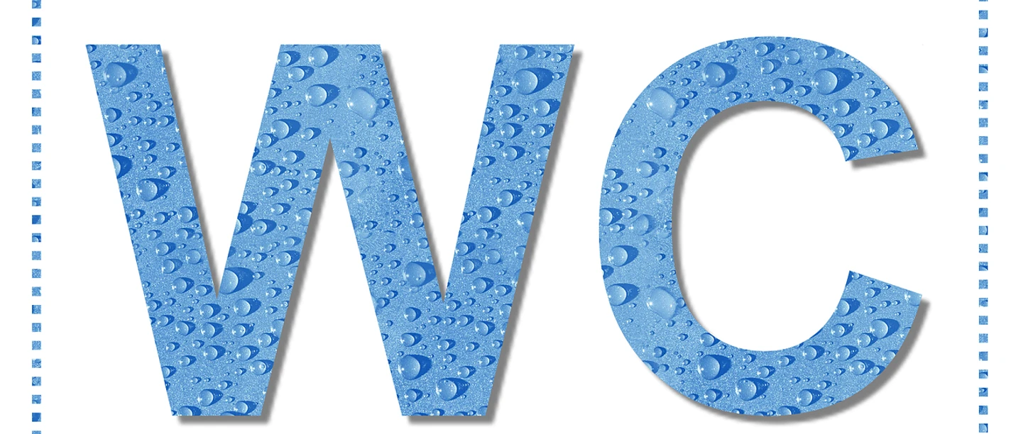WC.webp Schild mit der Aufschrift "WC" in hellblau