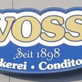 © Gemeinde Salzbergen Ovales Logo der Bäckerei Voss mit goldener Schrift, Ährenmotiv und Aufschrift seit 1898.