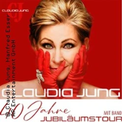 Claudia Jung lächelnd mit roten Handschuhen vor weißem Hintergrund, Schriftzug "30 Jahre Jubiläumstour".