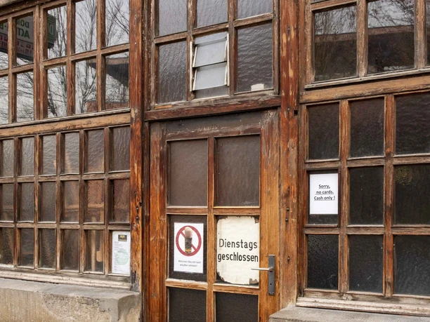 Lommerzheim Lommerzheim restaurant in Cologne, wood-paneled entrance with vintage charm.