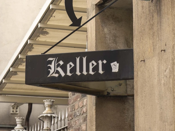 Lommerzheim Historic Lommerzheim restaurant in Cologne with classic beer signs on the façade.