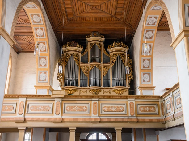 View of the richly decorated Silbermann organ from 1721 in St. Georgenkirche Rötha, Leipzig region
