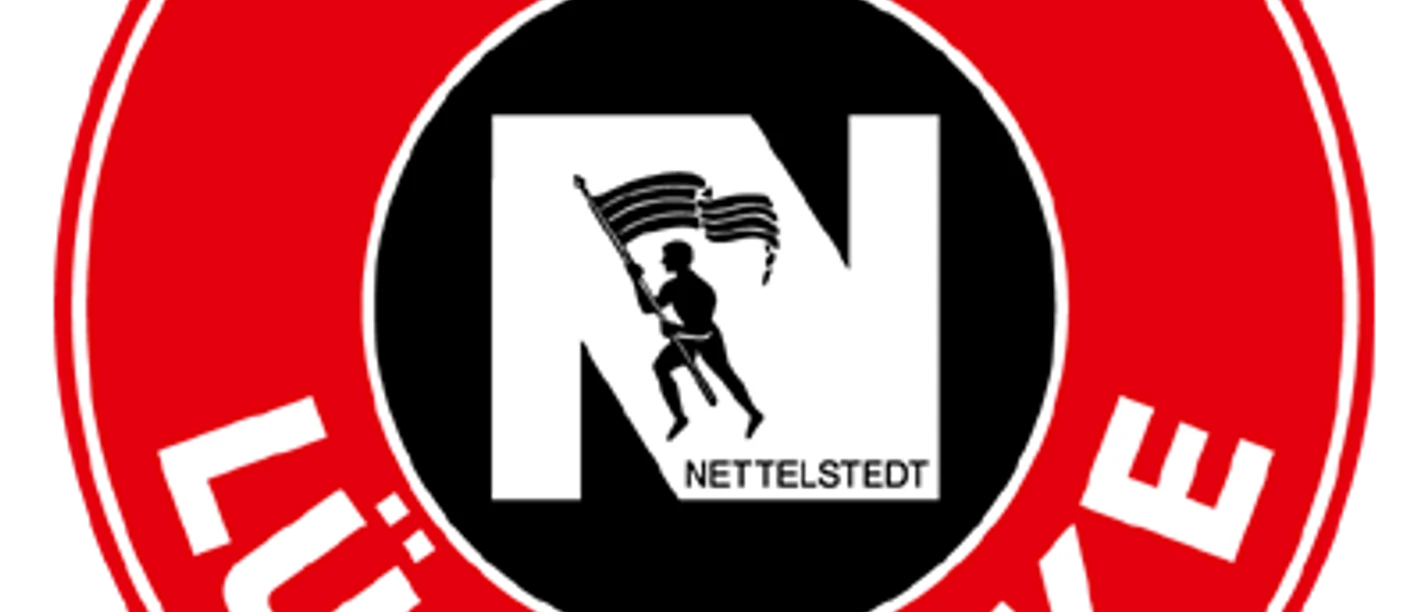 TuS N-Lübbecke_Logo Logo des TuS N-Lübbecke, rot-weiß mit zentralem N und Handballspieler. Kreisförmig gestaltet.