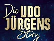 Goldene Schrift auf dunklem Hintergrund beschreibt die "Udo Jürgens Story" dynamisch und prägnant.