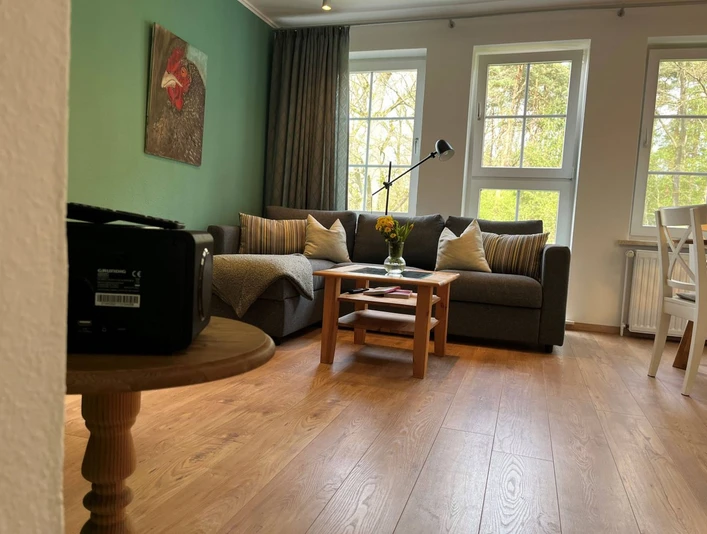 Wohnzimmer in der Ferienwohnung Hasenwinkel auf dem Ferienhof Stegen Wohnzimmer in der Ferienwohnung Hasenwinkel auf dem Ferienhof Stegen in WietzendorfLiving room in the Hasenwinkel vacation apartment on the Stegen vacation farm in WietzendorfStue i ferielejligheden Hasenwinkel på feriegården Stegen i WietzendorfWoonkamer in de vakantiewoning Hasenwinkel op de vakantieboerderij Stegen in Wietzendorf