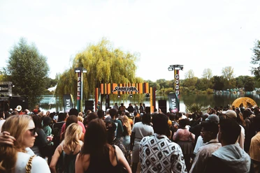 Summerjam A festival audience celebrates in front of a stage in the feel-good area at Summerjam.