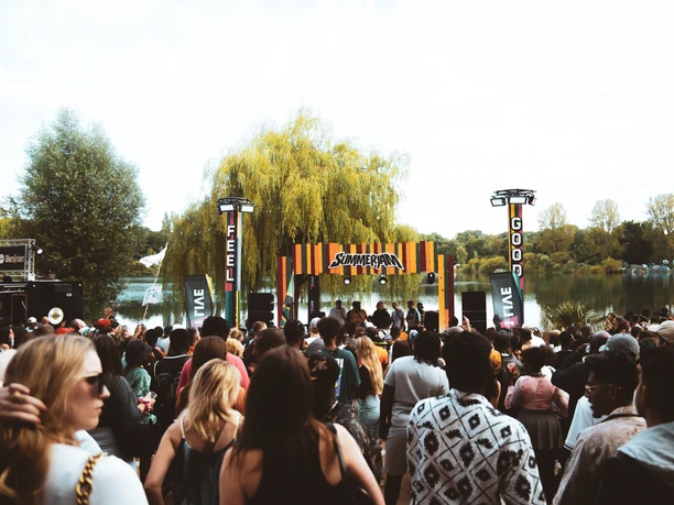 Summerjam A festival audience celebrates in front of a stage in the feel-good area at Summerjam.
