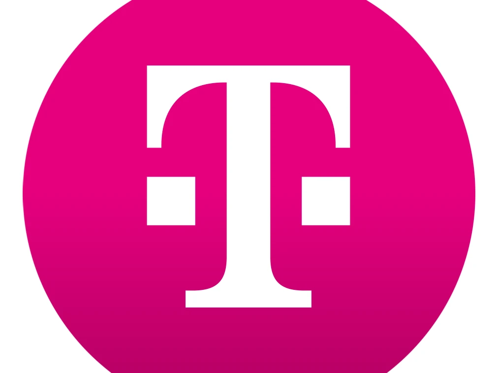 Ein magentafarbenes Logo mit einem stilisierten weißen "T" auf einem runden, schwarzen Hintergrund.