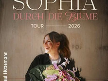 Das Bild zeigt eine Frau mit einem Blumenstrauß, die nach oben schaut und vor einer Betonwand steht. Der Text "Sophia durch die Blume Tour 2026" ist darüber platziert.