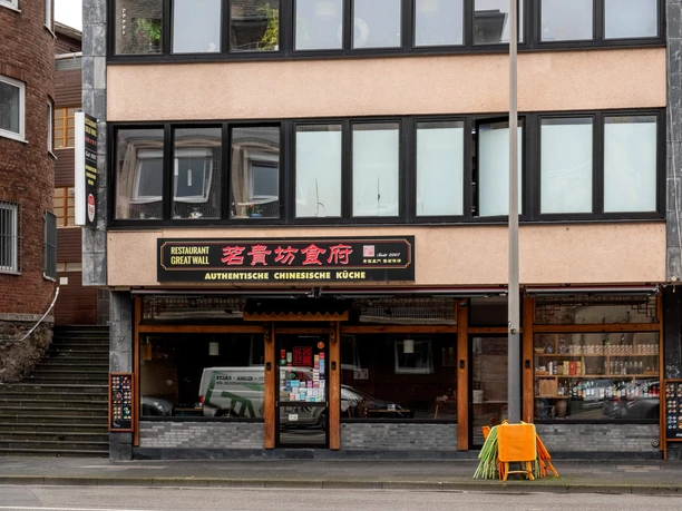 Great Wall Exterior view of the restaurant. Above the entrance is a sign with the name of the restaurant.