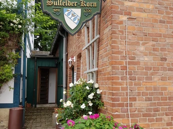 Das Eingangsschild "Sülfelder Korn" Zu sehen ist das Eingangsschild "Sülfelder Korn".
