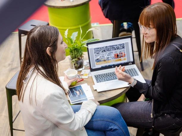 Your meeting & conference in Leipzig: conversation over coffee at the Booth at IMEX 2023 Conversation over coffee at the booth at IMEX 2023 for meeting & conference Leipzig convention