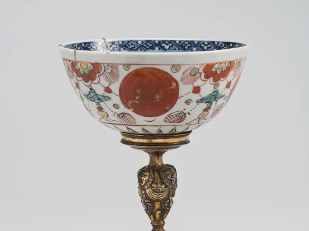 Manderscheidt Goblet Manderscheidt goblet; filigree goblet in East Asian style with floral patterns on an ornate, gilded base.