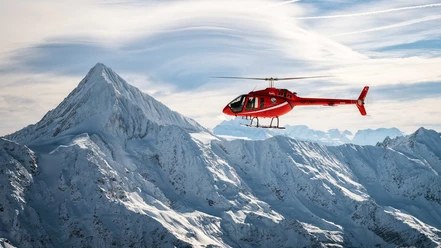 mountain-flyers-belp-titelbild-helokopter-berge-schnee.jpg