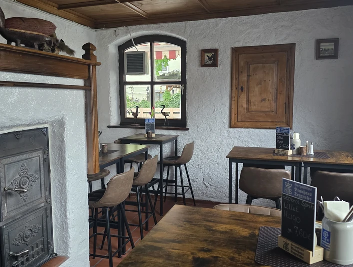 Franziskaner Stüberl Stube mit Kamin