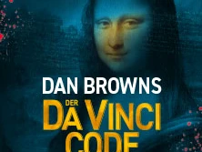 Das Poster zeigt die Mona Lisa im Dunkeln mit der Schrift "Der Da Vinci Code - Sakrileg" in kräftigem Gelb.