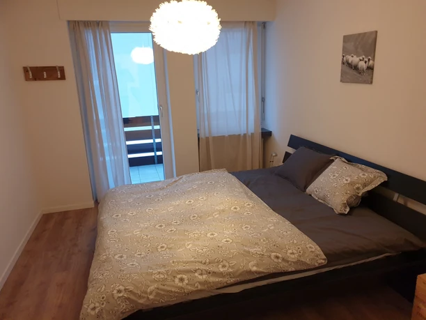 Chambre à coucher de l'appartement de vacances Dorfklatsch à Emmetten