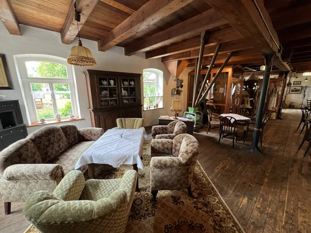 The interior of the Meyersiek Mill features historic furniture and a cozy atmosphere.