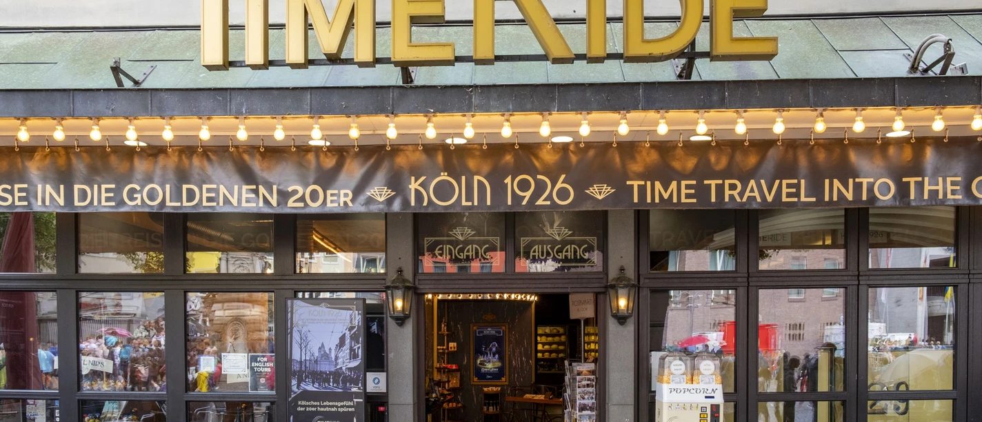 TimeRide Entrance to TimeRide Cologne, decorated with nostalgic elements and retro design.