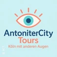 AntoniterCity Tours Logo mit stilisiertem Auge, Slogan: Köln mit anderen Augen erleben.