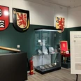 Sonderausstellung: Eine Stadt, viele Geschichten – Velbert und die kommunale Neugliederung im Jahr 1975 Eine Ausstellung über Velberts kommunale Neugliederung 1975 mit Schildern, Schauvitrine und Infotafel.