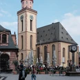 St. Katharinen Church Frankfurt, baroque, people and café in foreground.