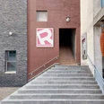 Entrance to Romanfabrik via stairs.
