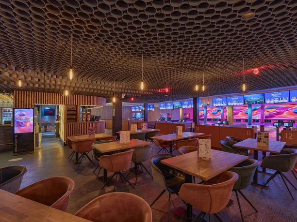 Bar area at West Bowling Spacious bowling alley with modern lighting effects and bar area with stylish, cozy seating.