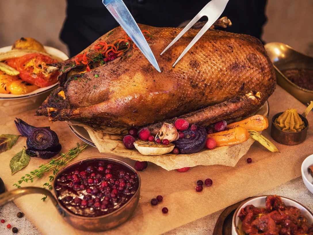 Roasted goose with herbs berries and vegetables Roasted goose with herbs berries and vegetables