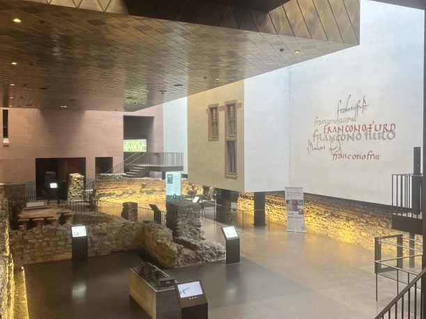 Archaeological courtyard with historic walls.