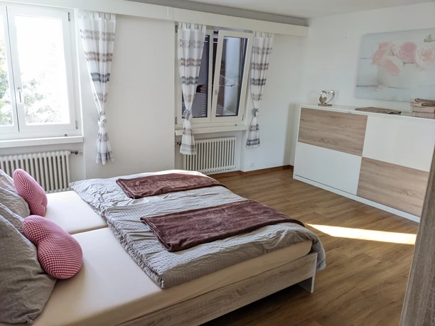 Maison d'hôtes Niederberger_chambre_à_coucher_Wirzweli