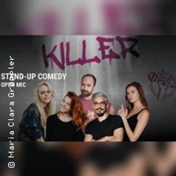 Fünf Personen vor grauer Wand mit pinkem Graffiti und Hinweis auf Stand-up-Comedy