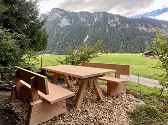 Seating at the Entschwil fireplace