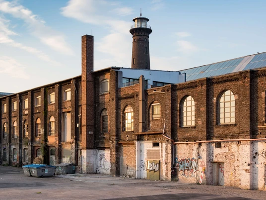 Helios site in Cologne-Ehrenfeld Historic brick façade of the Helios site in Cologne with striking tower.