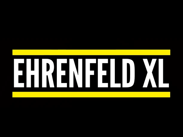 Logo Ehrenfeld XL The image shows a logo with the text "EHRENFELD XL" in white lettering on a black background. The text is framed by two yellow horizontal lines.