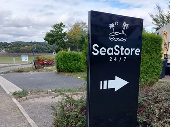 Hinweisschild SeaStore 24/7