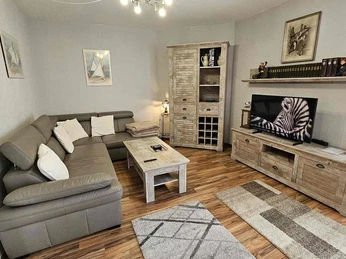 Gästewohnungen Akazie Bild 1-Wohn.jpg Blick in das Wohnzimmer der Wohnung 1 der Gästewohnung Akazie