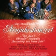 NJK_2026_PLAKAT_FIREBALLS Gruppe von Musikern in blauen Anzügen mit Instrumenten, Feuerwerk und Schriftzug zum Neujahrskonzert.